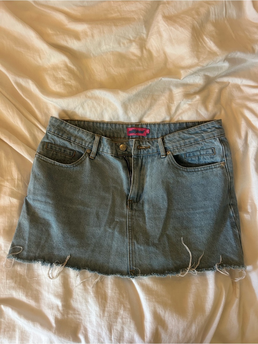 Edikted Light Blue Denim Mini Skirt with Frayed Hem
